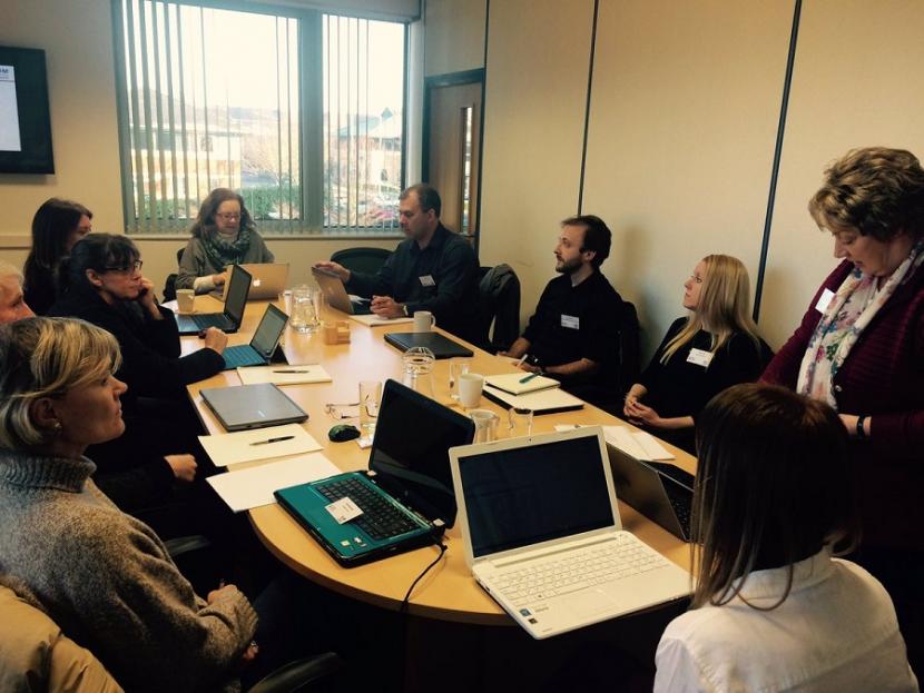 Delegates and trainer in the meeting room